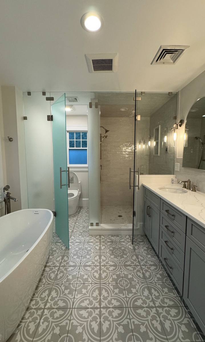 Frameless hinged shower door with frosted glass panels