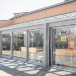 How Does Commercial Glass Installation Improve Building Appearance?
