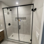 How Do Shower Enclosure Glass Panels Enhance Bathroom Design?