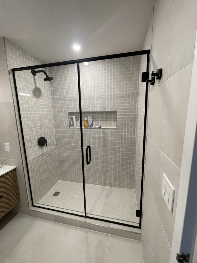 How Do Shower Enclosure Glass Panels Enhance Bathroom Design?
